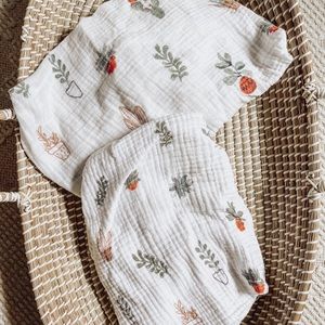 Little Unicorn matching Muslin crib sheet and changing pad cover